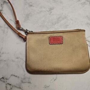 Coach Gold Wristlet with Orange Detail